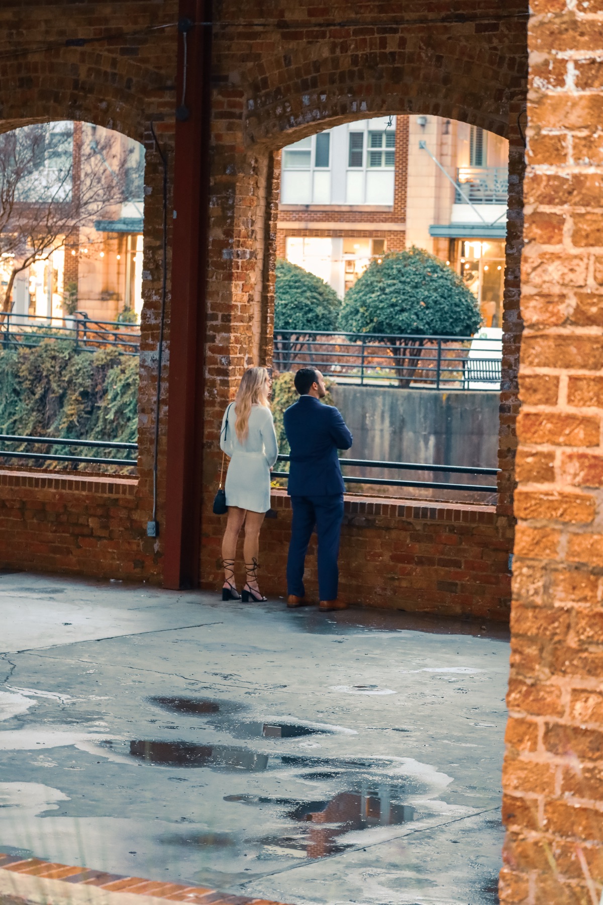 Looking out through the brick arches at RiverPlace before the ask